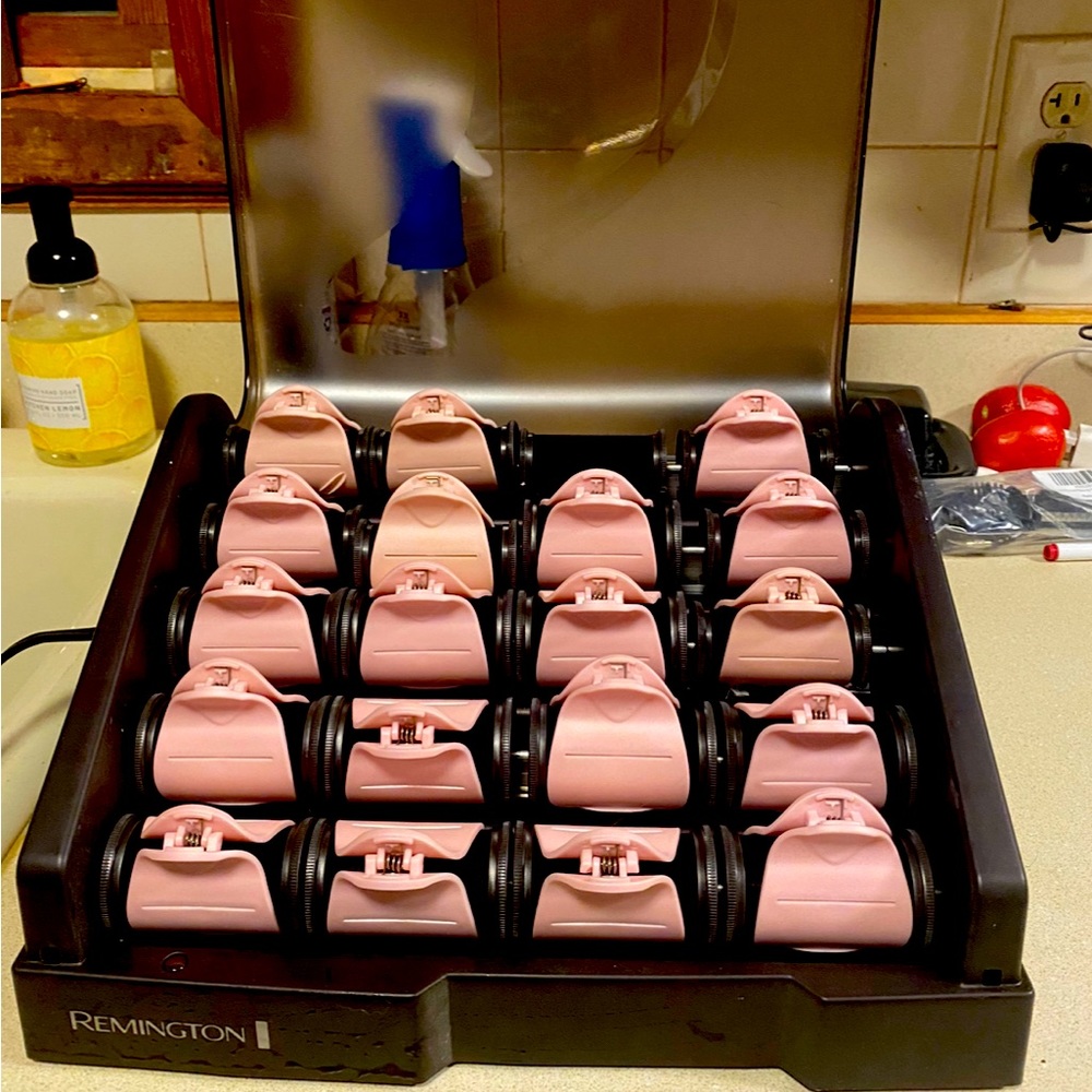Remington Hot Rollers. 20 rollers with 19 clips.